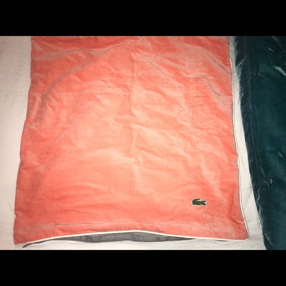 Lacoste peach velvet throw pillow